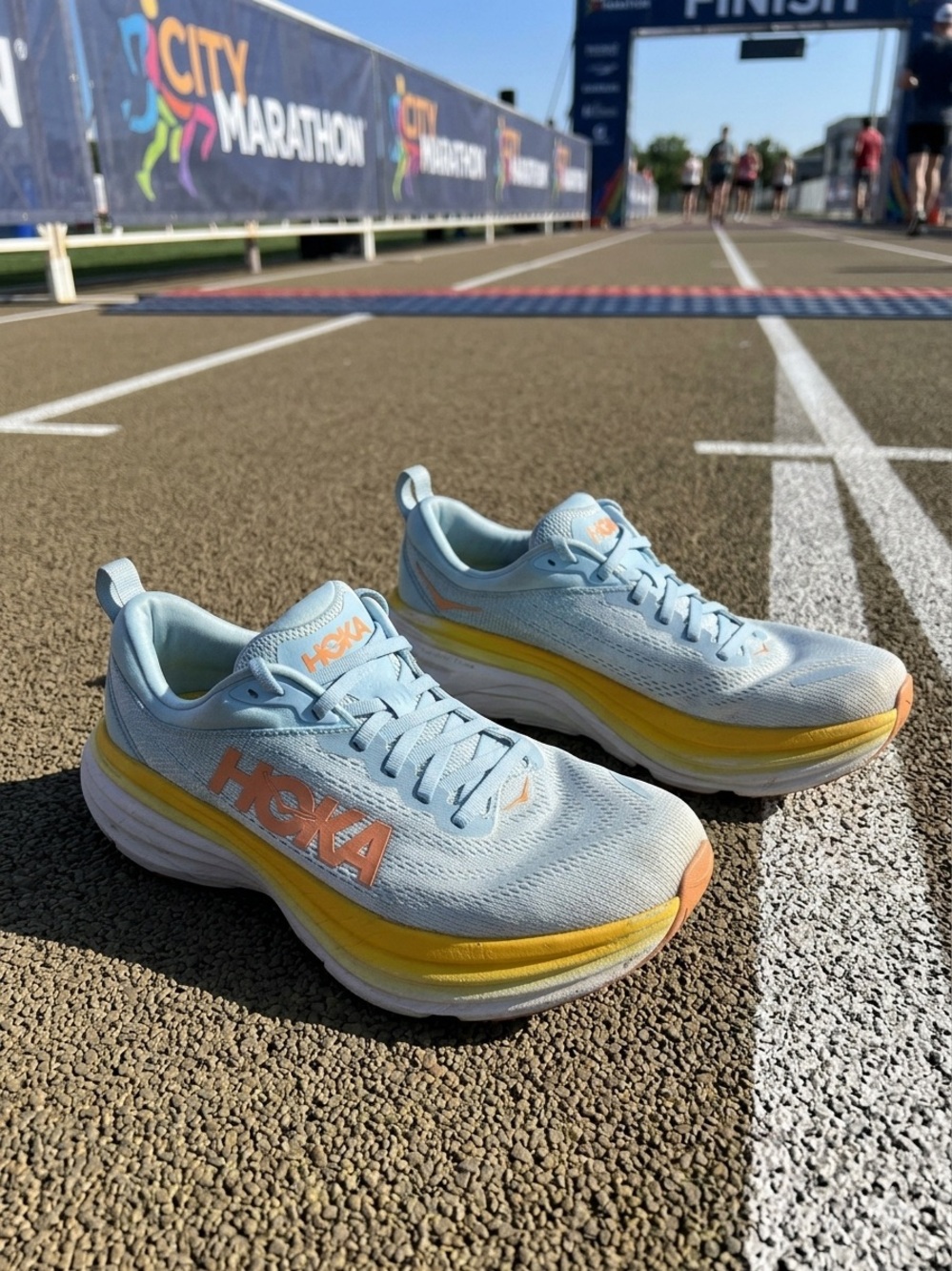 Hoka Women's Running Shoes in Light Blue with Yellow and Peach Accents